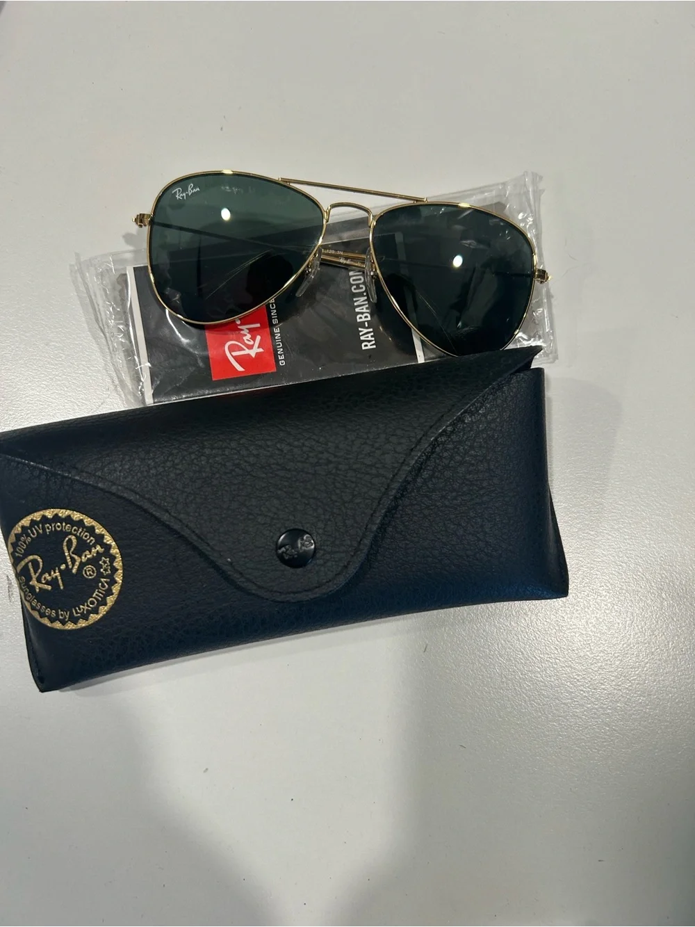 Ray-Ban Gold Frame Sunglasses with Dark Green Lenses